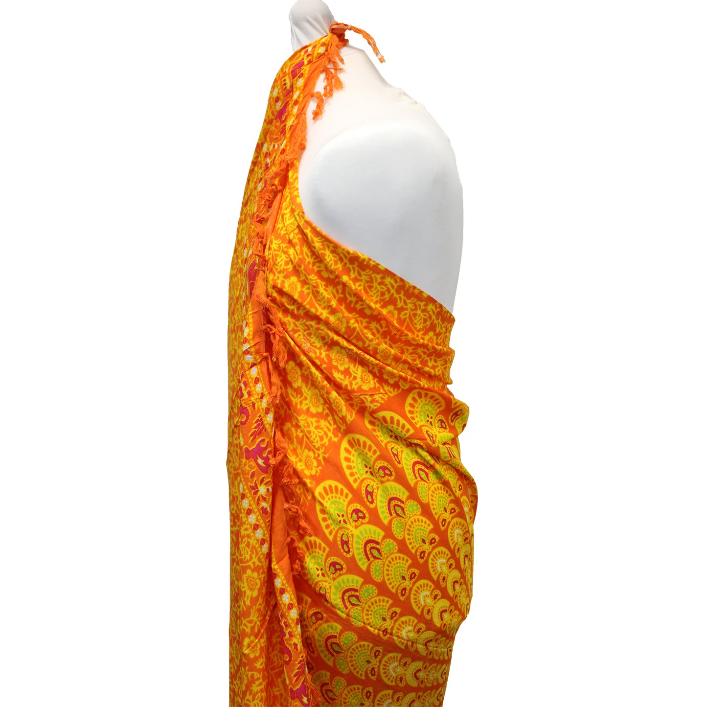 Side view of citrus-tone sarong with lime green and orange mandala print and shoulder fringe