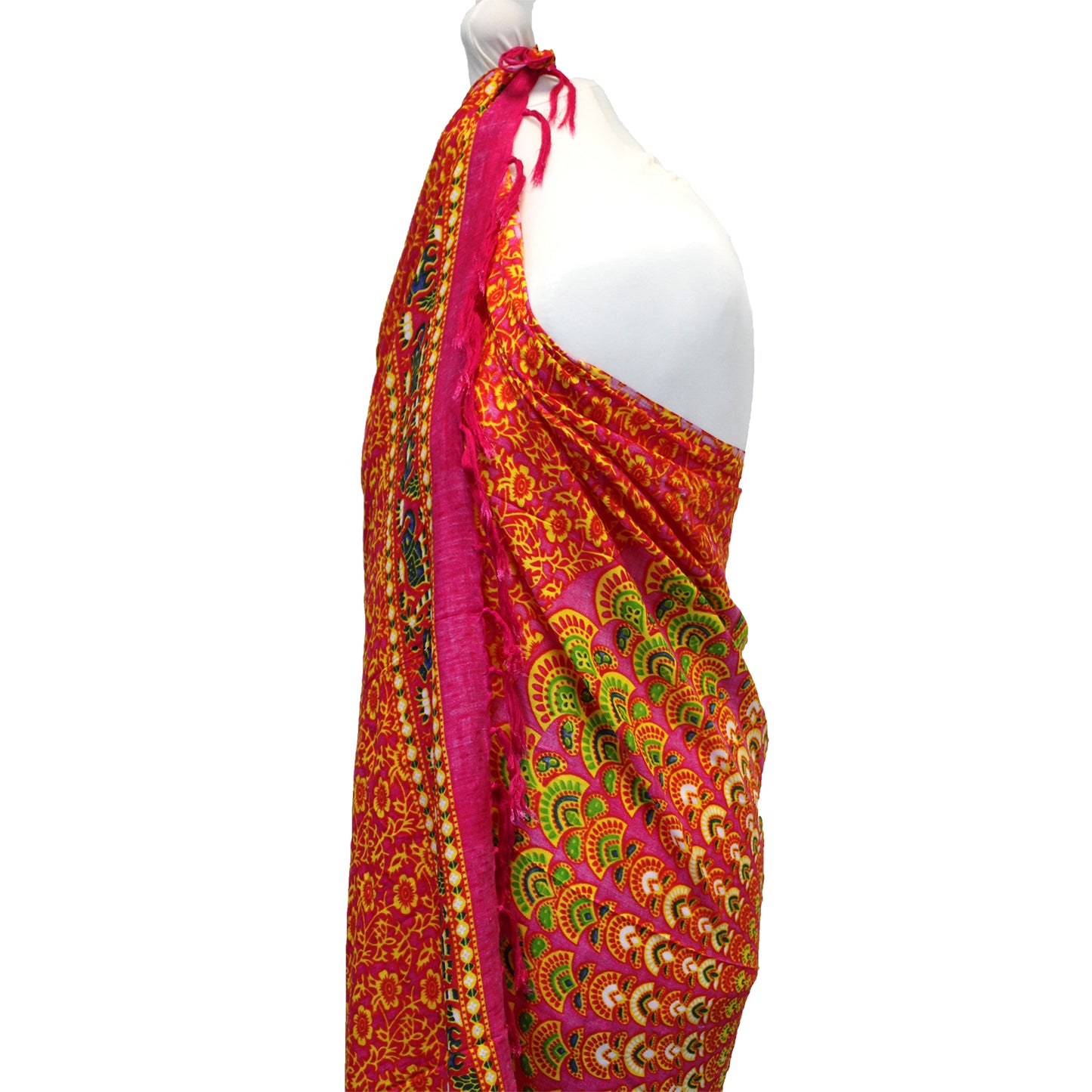Side view of pink mandala sarong showing green fan pattern and soft fringe edge