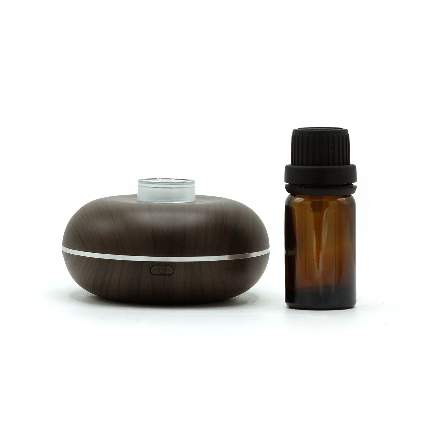 Essential oil diffuser in a home environment actively diffusing scent, powered via USB with no water needed