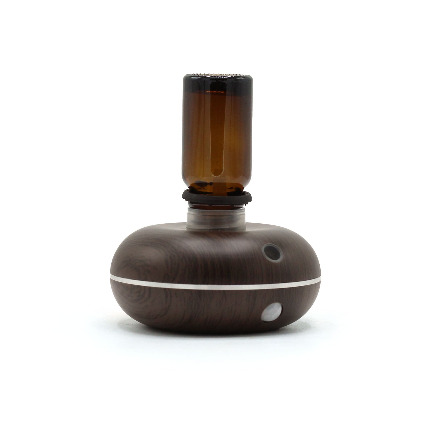Motion-activated cordless diffuser with amber essential oil bottle, ideal for travel, home, or workspace aromatherapy