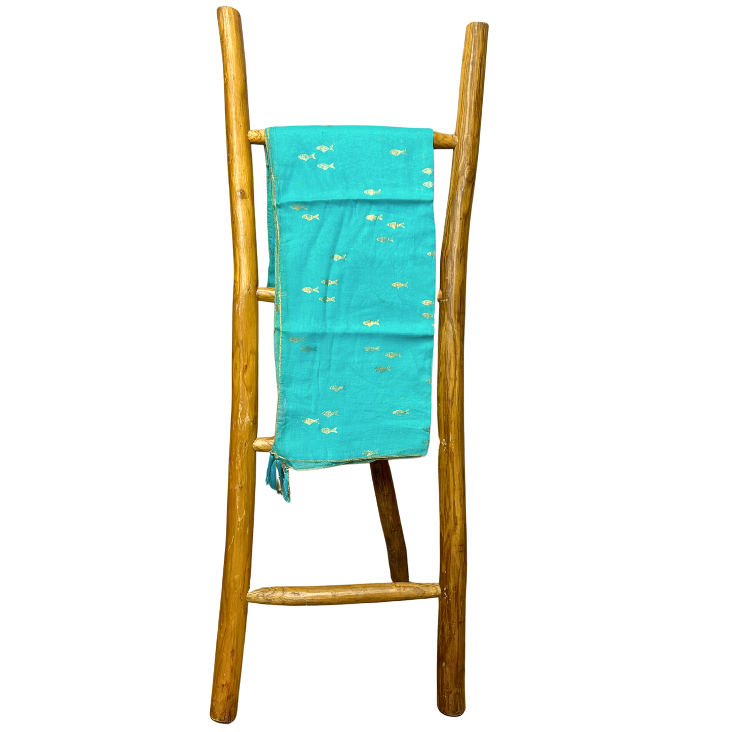 Lightweight turquoise pario with gold fish motifs, shown draped on rustic wooden ladder with tassels