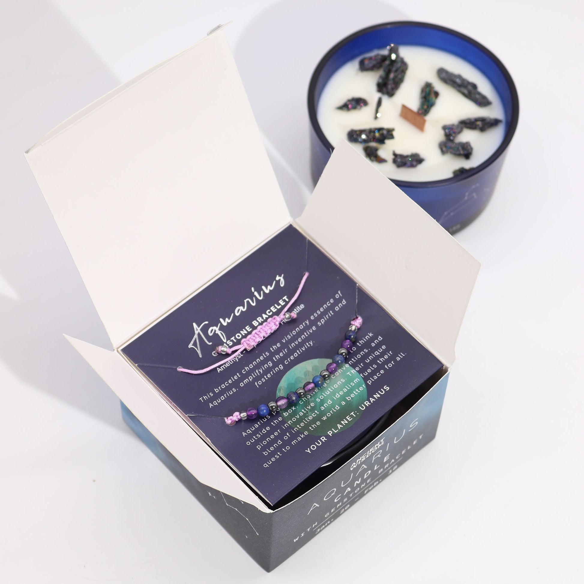 Aquarius crystal candle and gemstone bracelet shown together as a zodiac gift set for intuition, mental expansion and spiritual innovation