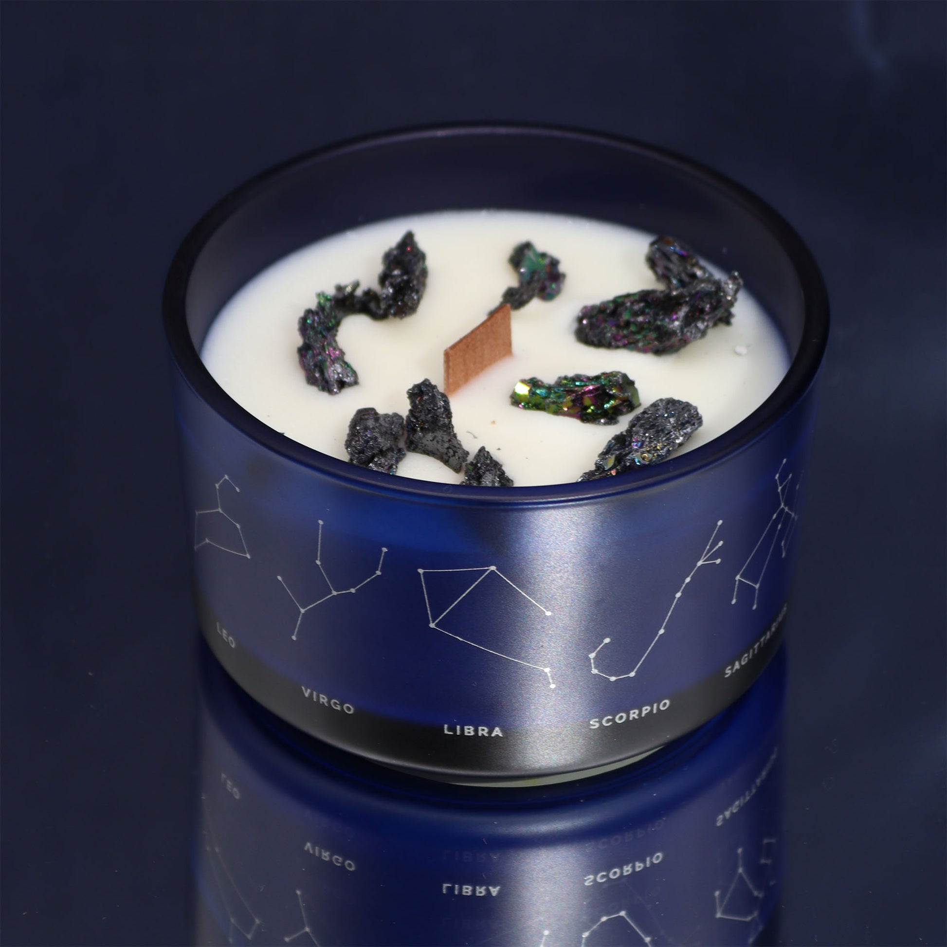 Open Aquarius candle infused with amethyst and lapis lazuli crystals, scented with mandarin, lavender and sandalwood for creativity and inner clarity