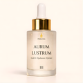Aurum Lustrum gold and hyaluronic hydrator bottle with dropper on a light beige background
