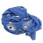 Rich blue cotton pario with hand-painted gold and white evil eye design, draped and folded with tassels