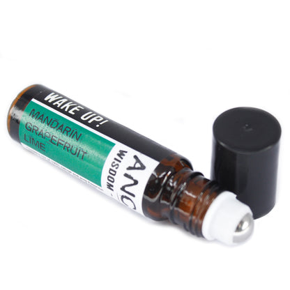 Open bottle of Energizing Citrus essential oil roll-on showing roller for easy application.