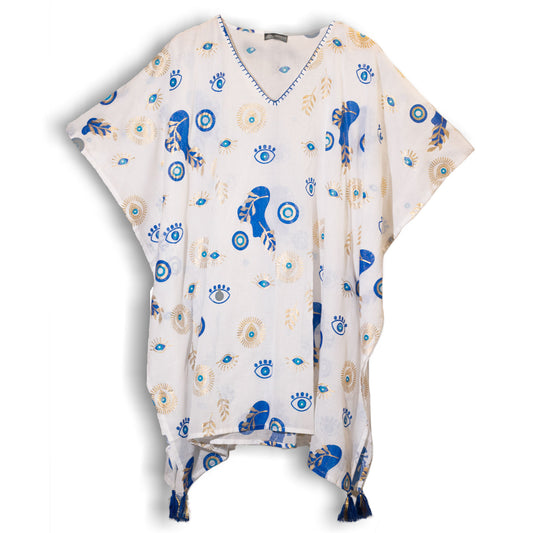 Lightweight white cotton kaftan with blue and gold evil eye design and tassel corners, flat laid