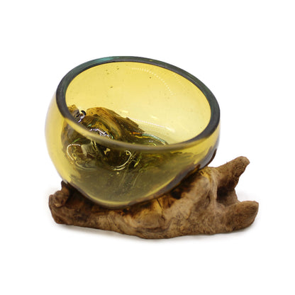 Second angled perspective of small molten amber glass bowl atop organic wood, blending artisan craft with natural design.