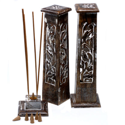 Tall mango wood incense tower in action with incense sticks inserted, showing smoke ventilation and dual-use design.