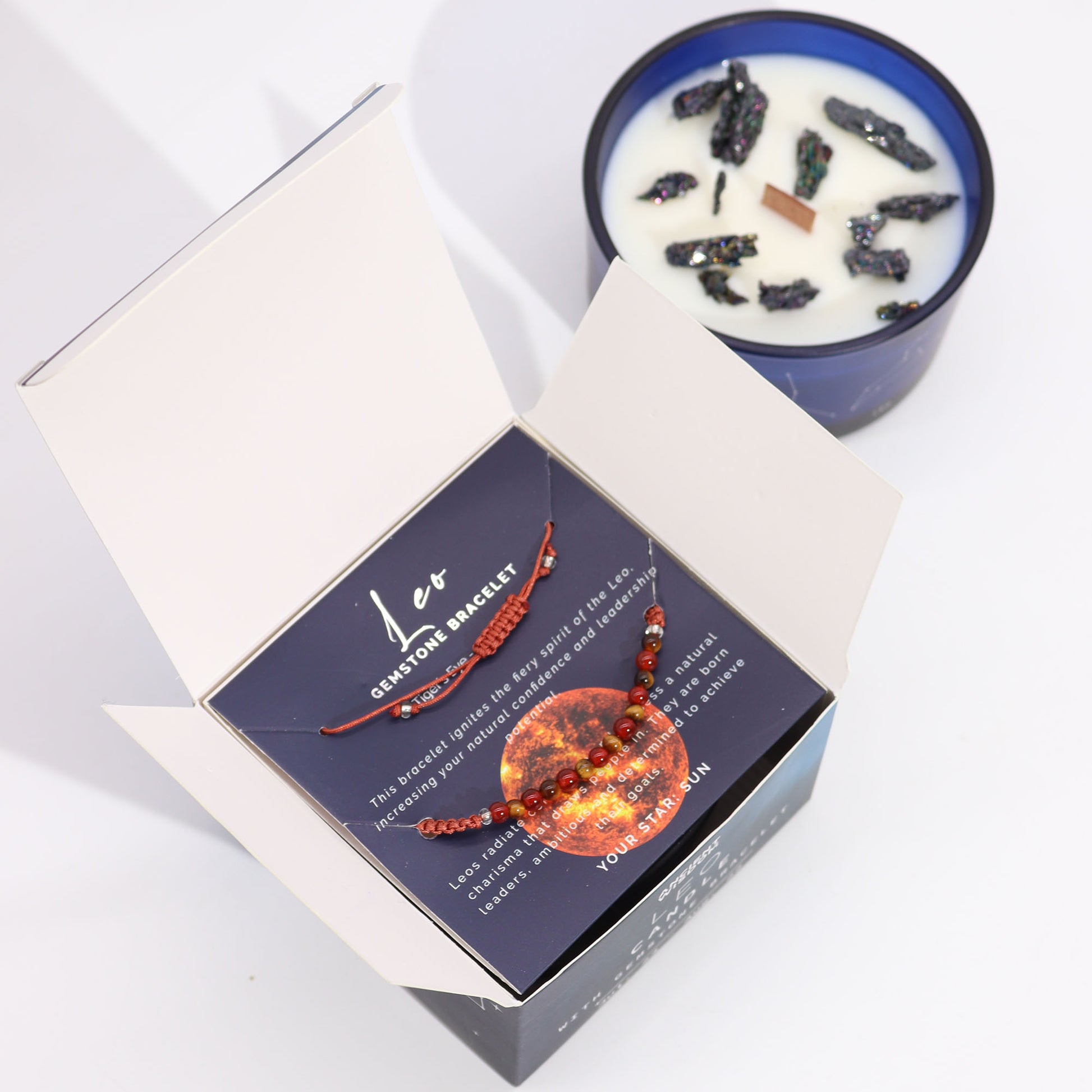 Leo zodiac crystal candle and gemstone bracelet displayed together as a spiritual gift set for self-expression, courage, and radiant Leo energy