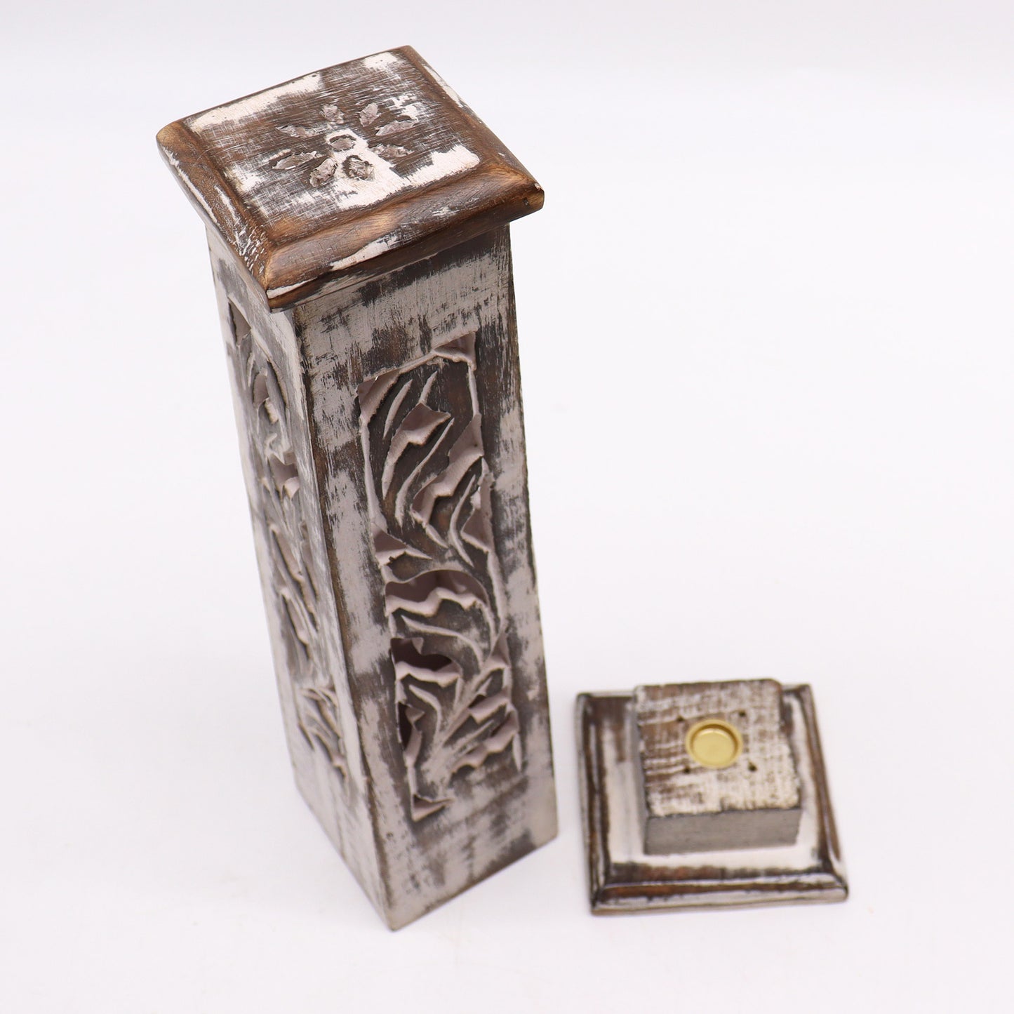 Handcrafted incense tower shown closed with square base, carved details, and rustic mango wood finish.