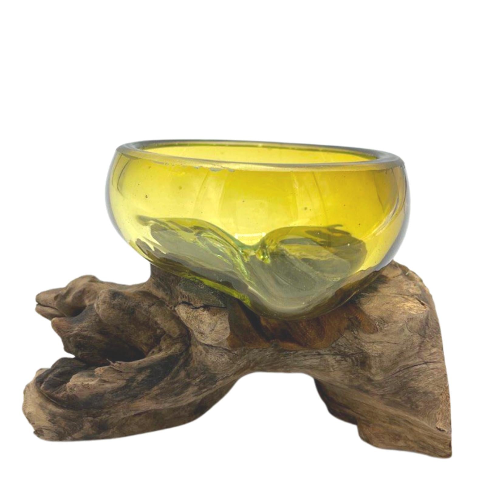 Front view of molten amber glass bowl fused onto natural wood, handcrafted as a small decorative dish for rituals or gifting.