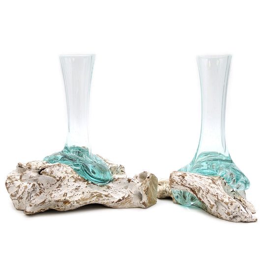 Pair of molten glass vases resting on whitewashed wood bases, handcrafted for earthy, boho-style home decor.