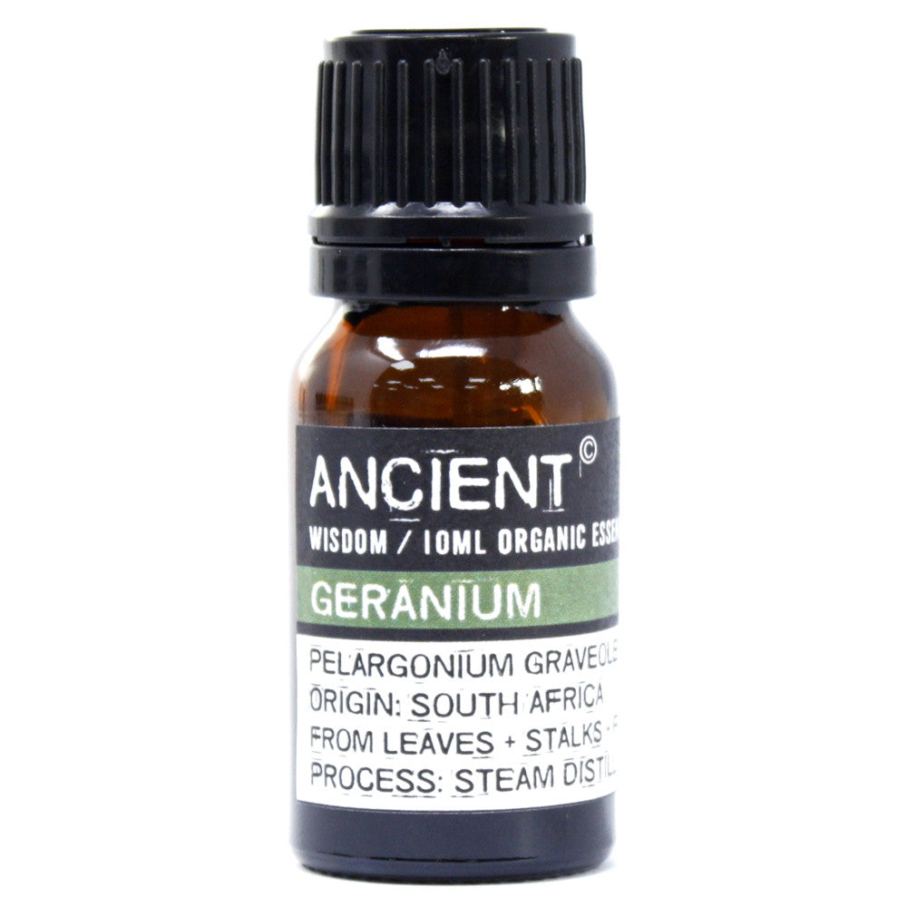 Close-up of a 10ml amber bottle labeled “Ancient Wisdom Organic Geranium Essential Oil,” highlighting product details and floral therapeutic benefits.