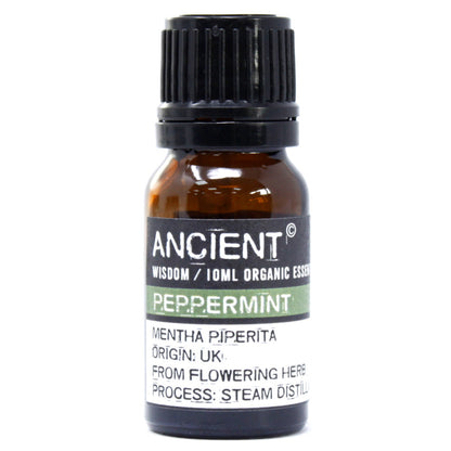 Close-up of a 10ml amber bottle labeled “Ancient Wisdom Organic Peppermint Essential Oil,” emphasizing its energizing and focus-enhancing properties.