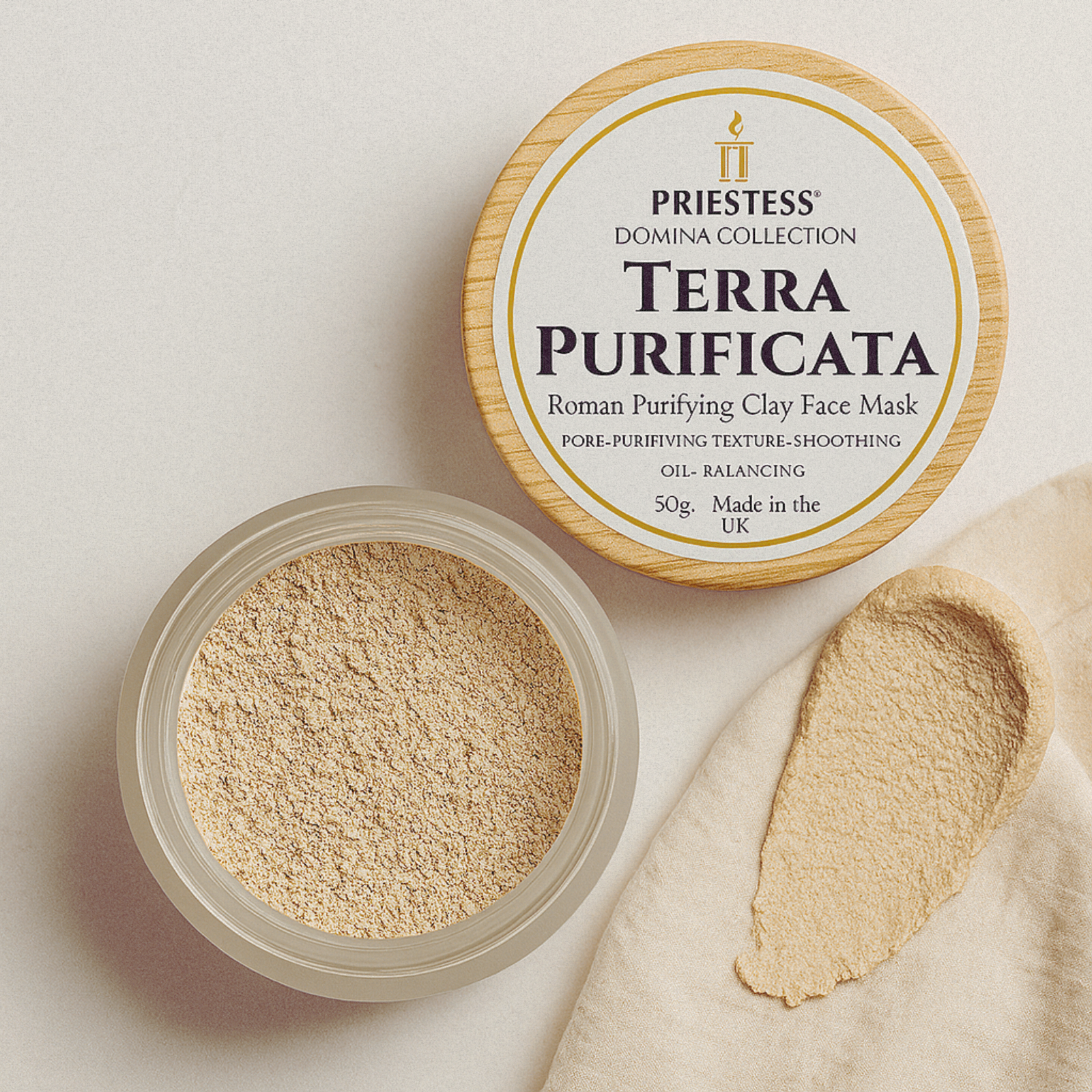 Priestess Terra Purificata Roman Purifying Clay Face Mask with open container on a light background