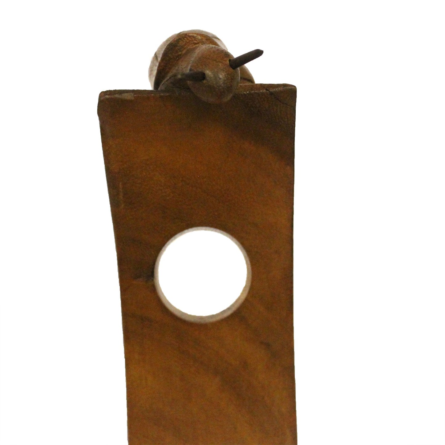Snail-shaped wooden wine holder with a central hole, eco-resin finish. front close up