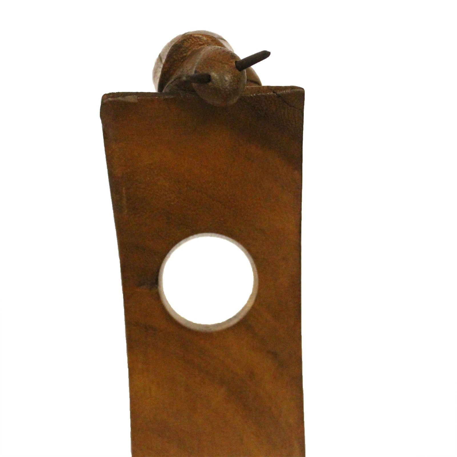 Snail-shaped wooden wine holder with a central hole, eco-resin finish. front close up