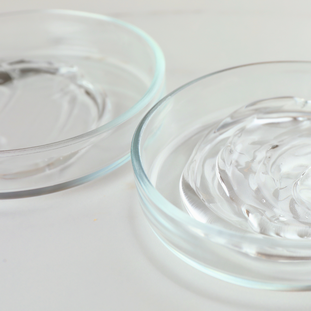 Two clear glass bowls on a light background