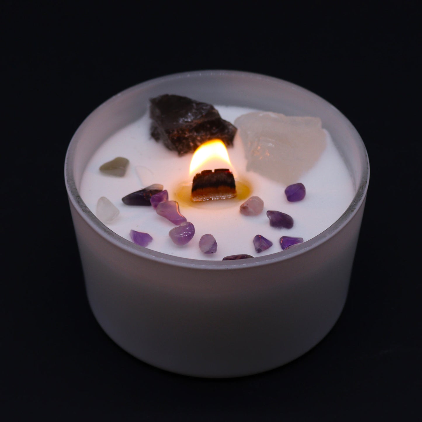 Lit Crown Chakra Candle with Ocean Breeze scent for divine meditation and higher consciousness rituals