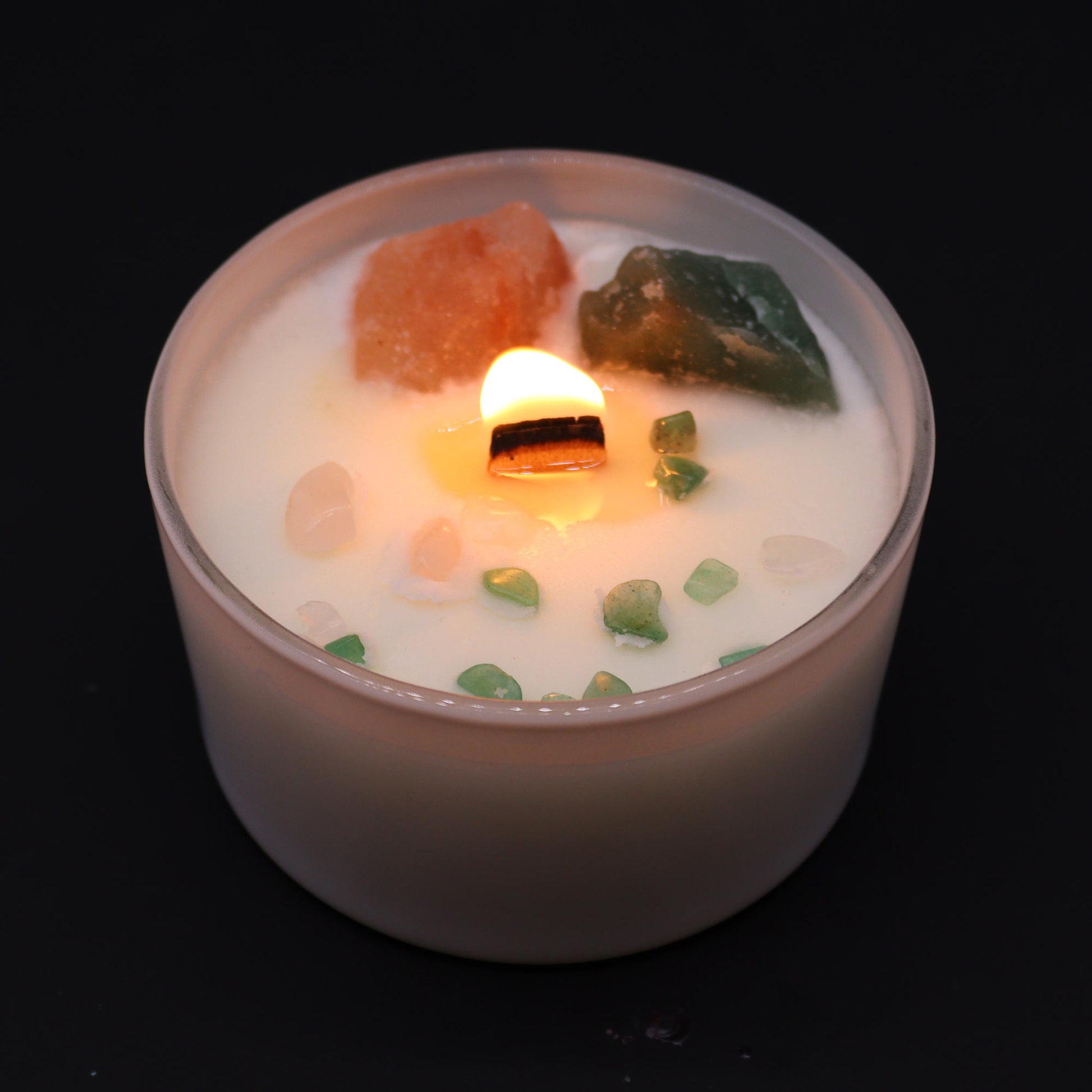 Lit Heart Chakra Candle with Rose Musk fragrance to nurture self-love and emotional balance