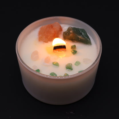 Lit Heart Chakra Candle with Rose Musk fragrance to nurture self-love and emotional balance