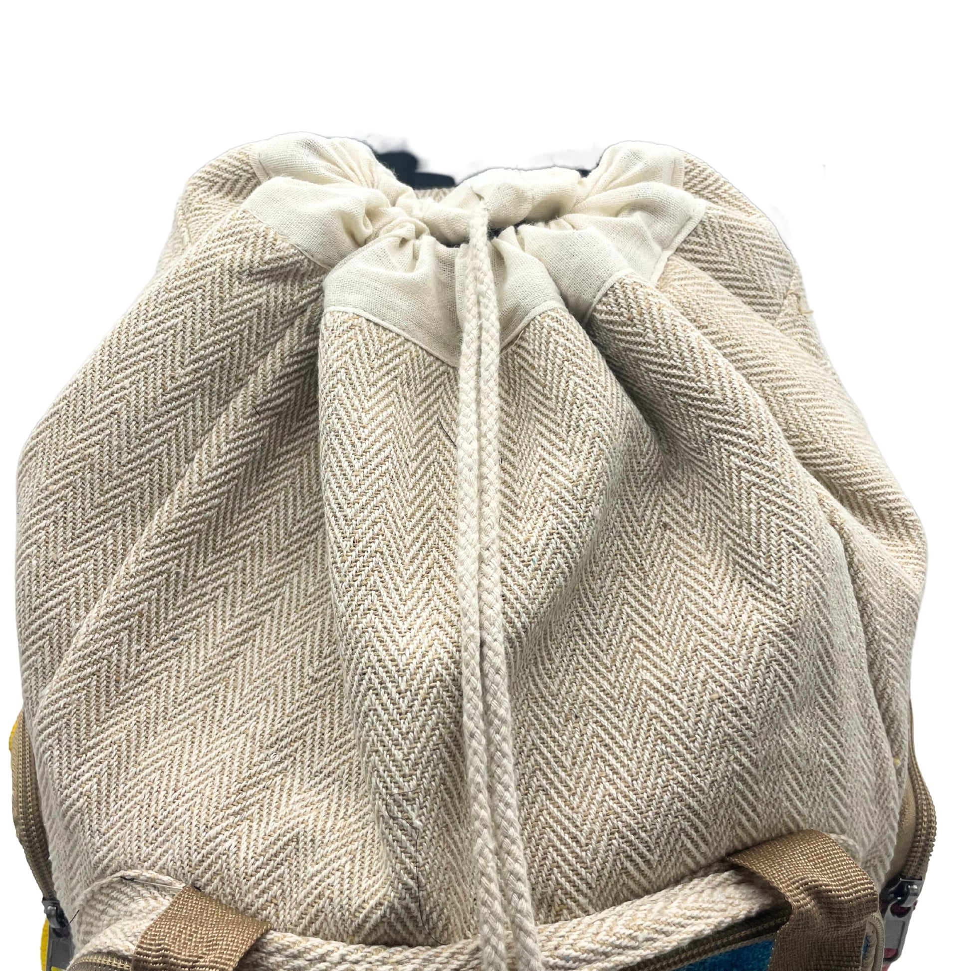 Close-up of drawstring closure and herringbone cotton-hemp weave on large eco backpack, secure and breathable design