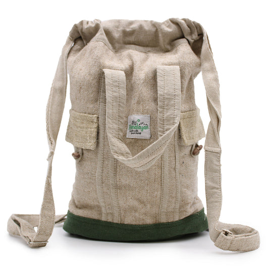 Front view of handmade large hemp backpack with green base, eco-friendly travel and commuter bag made in Nepal