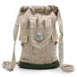 Front view of handmade large hemp backpack with green base, eco-friendly travel and commuter bag made in Nepal