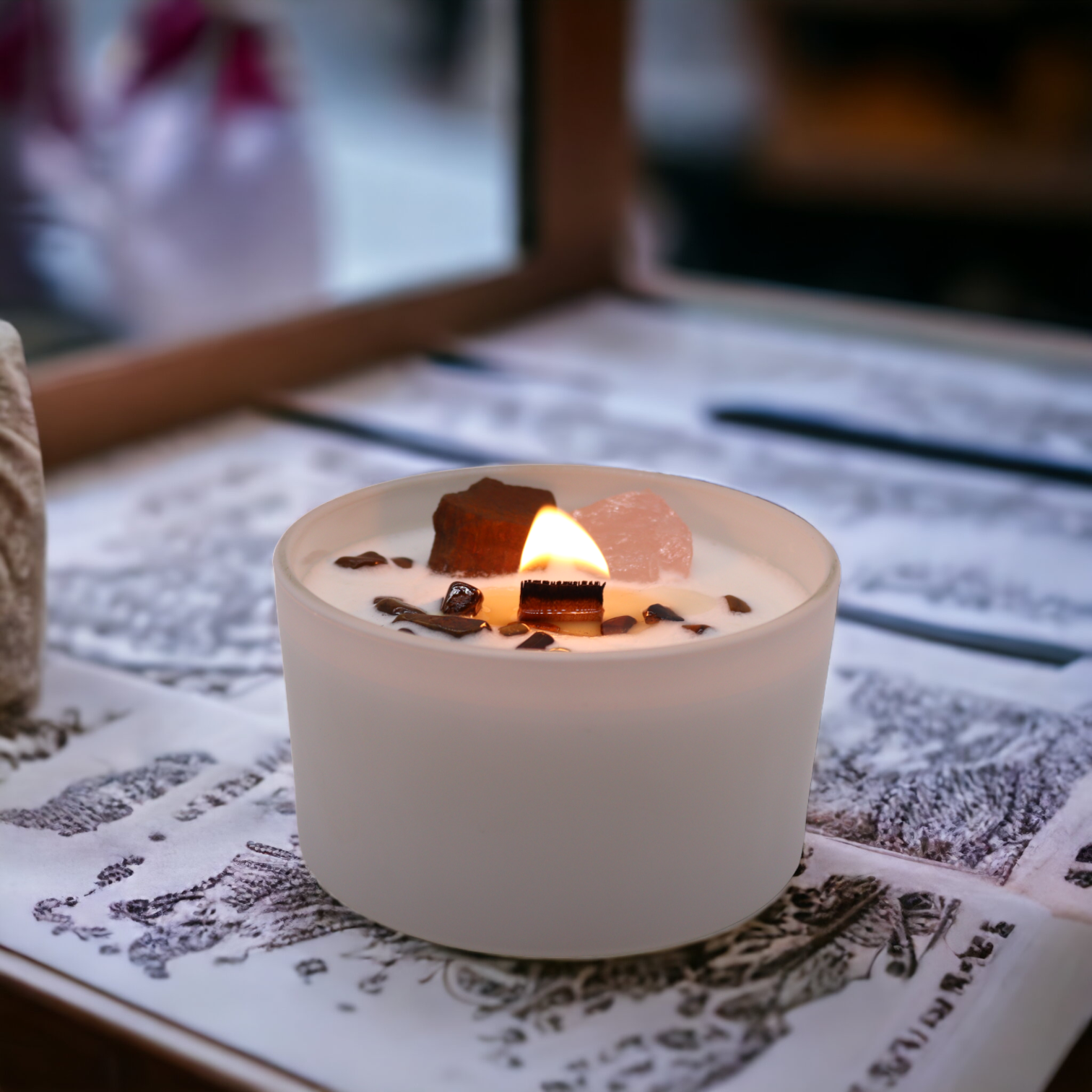 Sacral Chakra Candle displayed in sacred space setting with altar tools and sensual ambiance