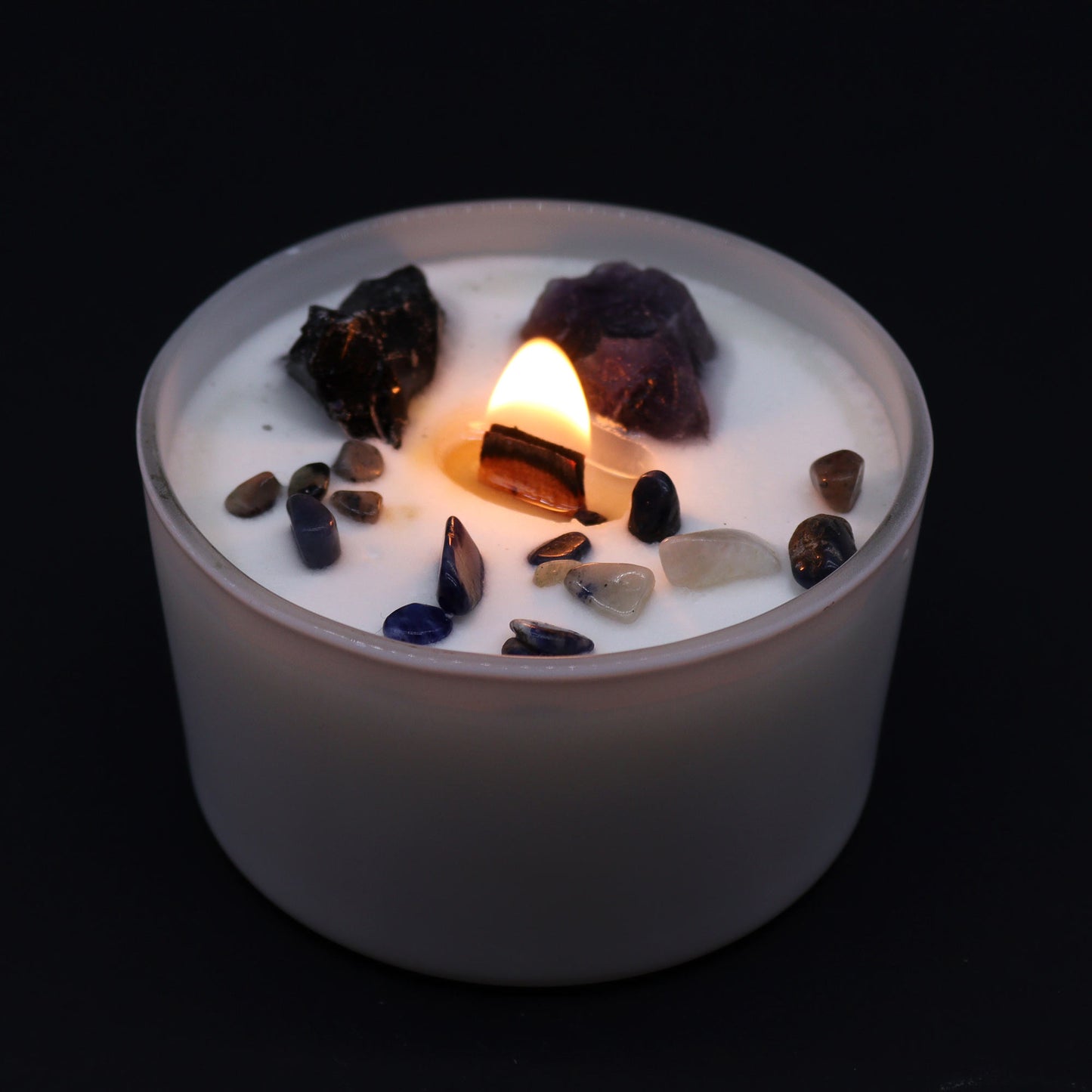 Lit Solar Plexus Candle with Deep in the Forest scent for empowerment rituals and chakra alignment