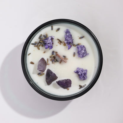 Top view of The Moon Candle showing soy wax, Amethyst crystals, and floral infusion for lunar rituals