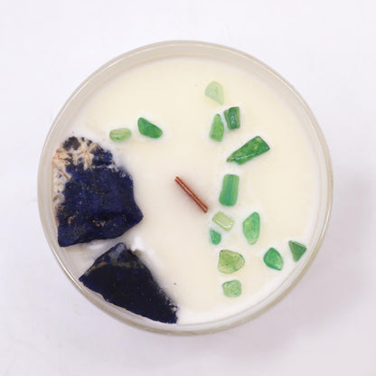 Top view of Throat Chakra Candle showing embedded crystals and blue soy wax for chakra healing